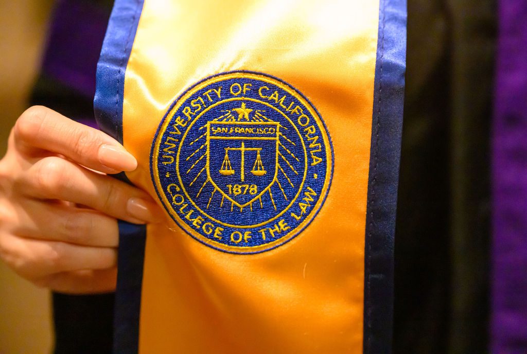 Yellow and blue stole featuring the UC Law SF seal.