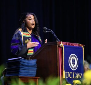 LaJeanné Shelton ’25 speaks behind a lecturn
